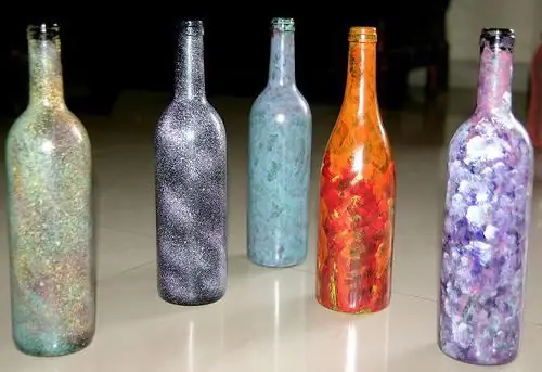 Painting a bottle with acrylic paints. Stained glass bottle painting